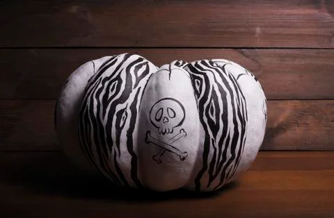 Halloween pumpkin on wooden background Photos