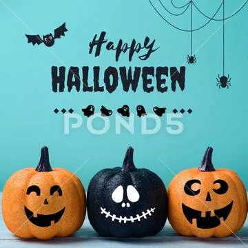 Halloween pumpkins and spooky decorations on vibrant blue background PSD Template