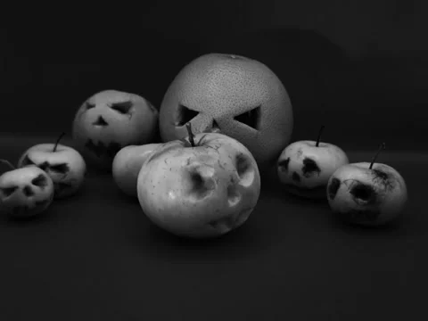 Halloween pumpkins approaching — black and white Stock Footage 344454718