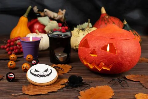 Halloween pumpkins on the background of a dark wall with ghosts, bats, spiders Foto stock