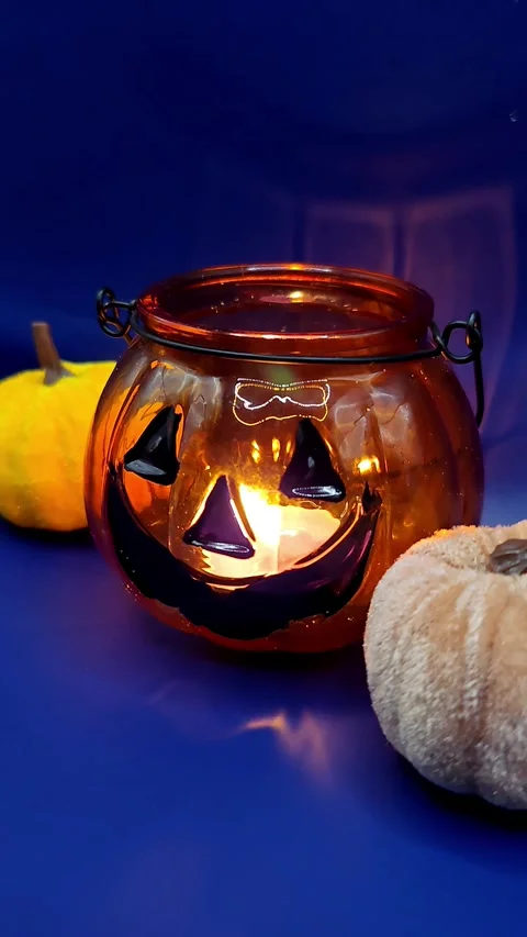 Halloween pumpkins on a blue background Видео 319695787