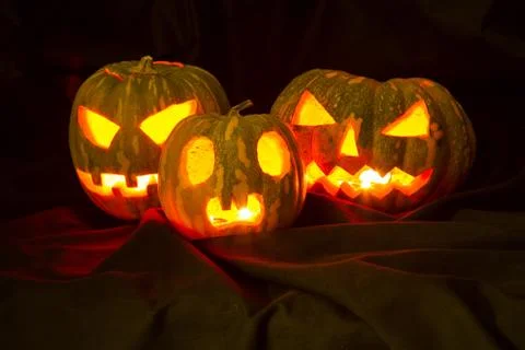 Halloween pumpkins in the dark Stock Photos