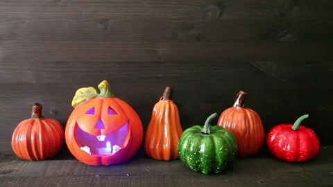 Halloween. Pumpkins glow in the dark. Still life with pumpkins Stock Footage 140449931