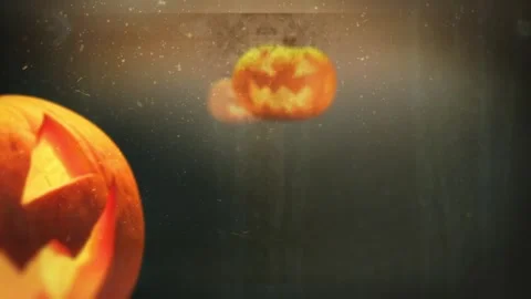 Halloween pumpkins glowing in the dark. Stock Footage 318467953