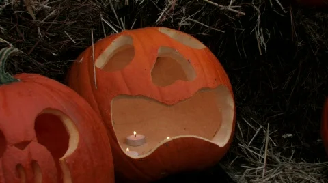 Halloween pumpkins lighted with candles Stock Footage