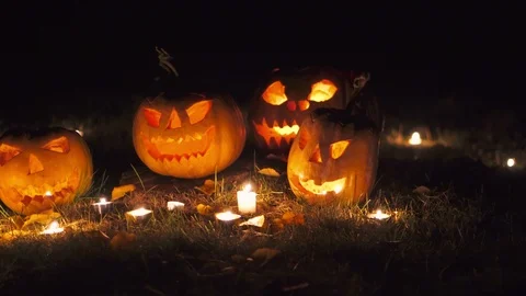Halloween pumpkins at night rotation Stock Footage