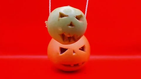 Halloween pumpkins on a red background 库存影片 344455273
