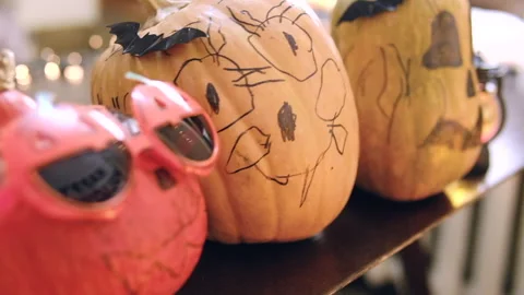 Halloween pumpkins on the table 動画素材 253286982