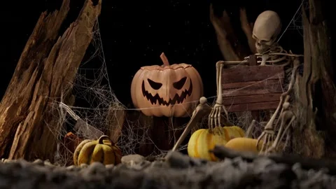 Halloween scene with pumpkins and skeleton. Stock Footage 318468053