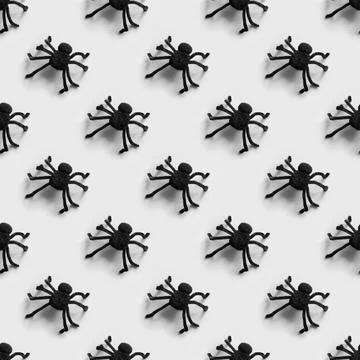 Halloween seamless pattern of many black spiders . Stock Photos
