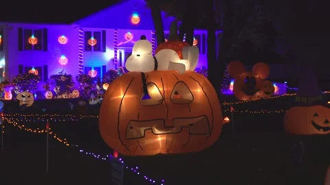 Halloween Snoopy on jack o lantern display Saugus Mass. USA October 19 2024 Video stock 289480475