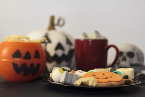 Halloween table with assorted fun and spooky treats Stock Photos