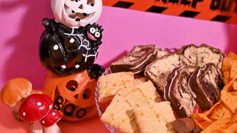 Halloween Table Setting: Pastel Decor and Candies Stock Footage 251517688