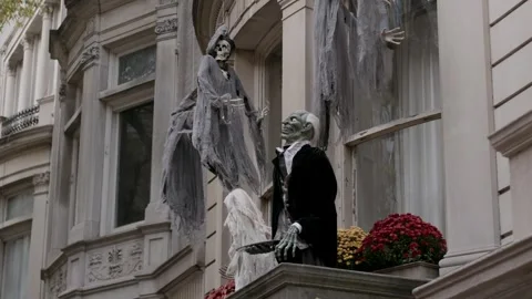 Halloween Window Decorated with Ghosts and Zombies for a Spooky Atmosphere and Stock Footage 314251654