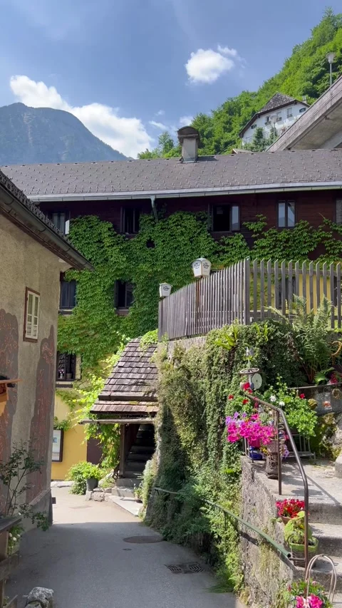 Hallstatt. Charming street between high mountains. Tourist spot. Stock Footage 313055004
