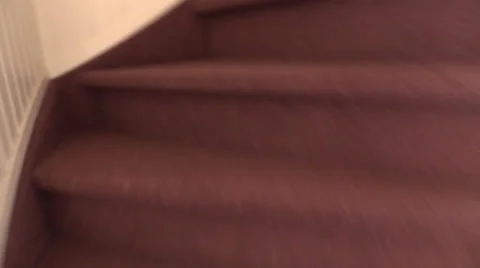 Hallucinating while going up stairs Stock Footage 25788182