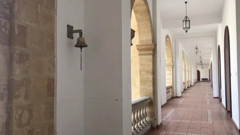 Hallway and a Bell at the Wall of a Monastery Stock Footage 101845802