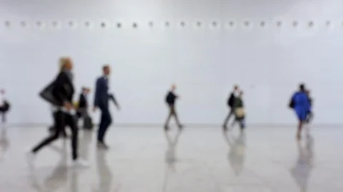 Hallway of convention center with blurred crowd of people passing through Stock Footage 122573133