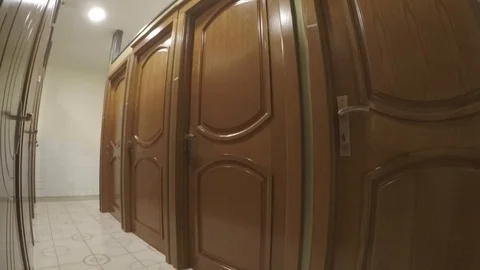 Hallway doors in row diagonal view upside down Video stock 97228872