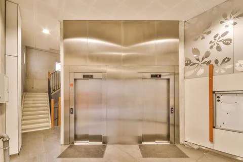 Hallway interior with elevator doors Stock Photos