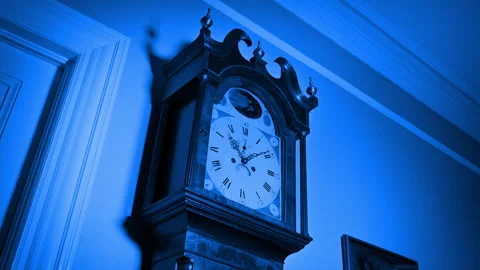 Hallway Is Lit Up With Lightning Strikes Over Grandfather Clock Stock Footage 260648841
