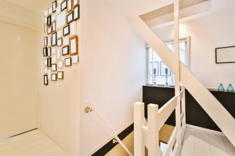 Hallway with many blank frames Stock Photos