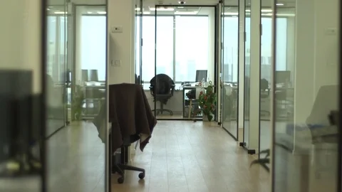 Hallway in Office with Empty Desk in Background Stock Footage