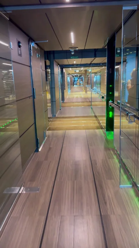 The hallway on the way to the concierge desk on the MSC Cruise Ship Yacht Club Stock Footage 328298167