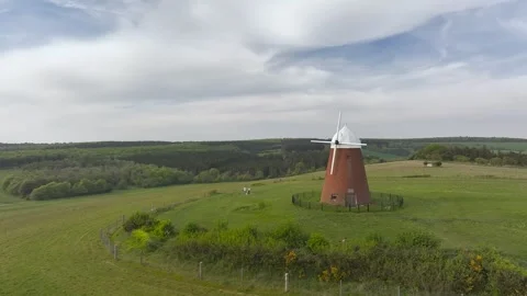 Halnaker Hill and the Windmill Trail from a drone, Boxgrove Village, West Sussex Video stock 344070773
