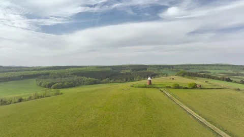 Halnaker Hill and the Windmill Trail from a drone, Boxgrove Village, West Sussex Video stock 344070996