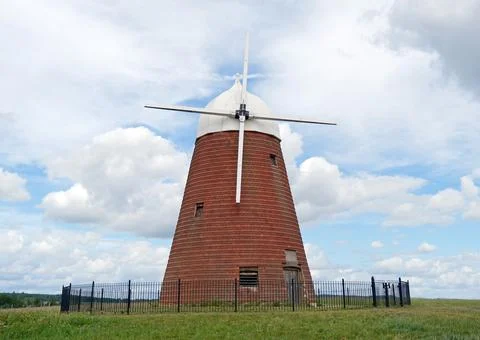 Halnaker Windmill, Brick Tower Mill Against Dramatic Summer Sky Stock Photos