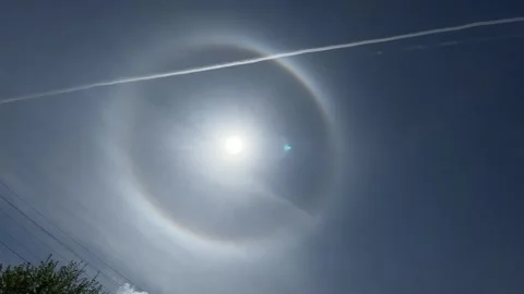 Halo sun effect optical phenomenon in Poland with airplanes in the air Stock Footage 241222728