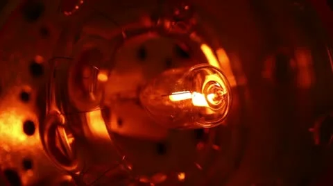 Halogen lamp illuminates Stock Footage 12720550