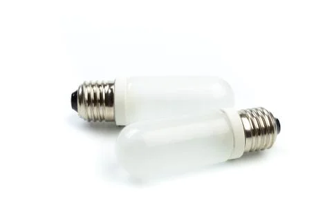 Halogen lamp on a white background. Lamp for studio flash close-up. Stock Photos