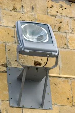 Halogen spotlight lamp on the wall Stock Photos