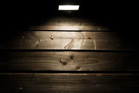 Halogen on wooden wall Stock Photos