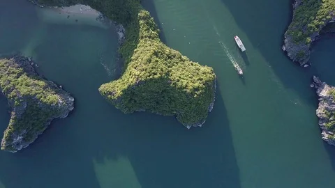 Halong Bay surrounded by incredible mountains and emerald water in Vietnam Stock Footage 123711031