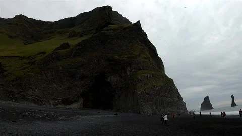 Halsanefshellir basalt column cave at Reynisfjara black sand beach, Iceland Stock Footage 334457504