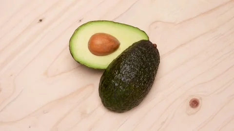 Halved avocado Stock Footage 320379622