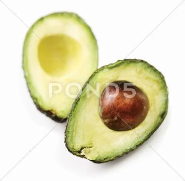A halved avocado Stock Photos