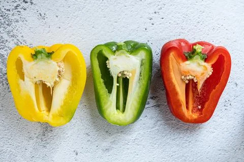 Halved bell pepper with white background Stock Photos