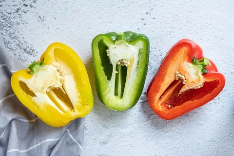 Halved bell pepper with white background Stock Photos