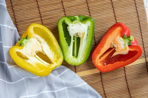 Halved bell pepper with white background Stock Photos