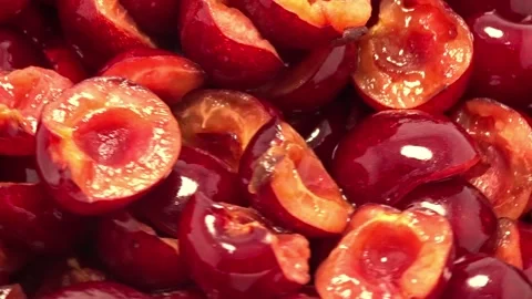 Halved Cherries Rotating Slowly, Close‑Up Shot Stock Footage 337050826