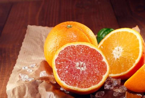 Halved fresh orange varieties Stock Photos