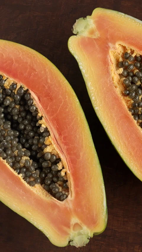 Halved fresh papaya fruit. Stock Footage 283447663