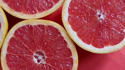 Halved grapefruit  Stock Footage 115637893