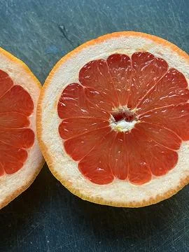 Halved grapefruit Stock Photos