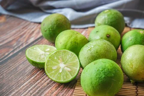 Halved lime on white background. Stock Photos