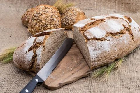 Halved loaf of bread Stock Photos
